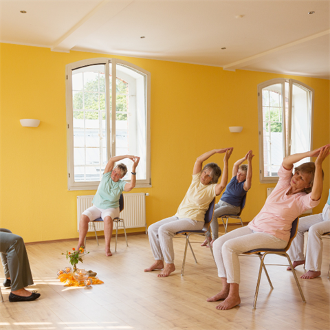 image of people doing Chair Yoga