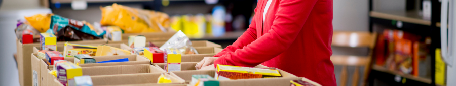 person sorting boxes