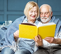seniors reading a book